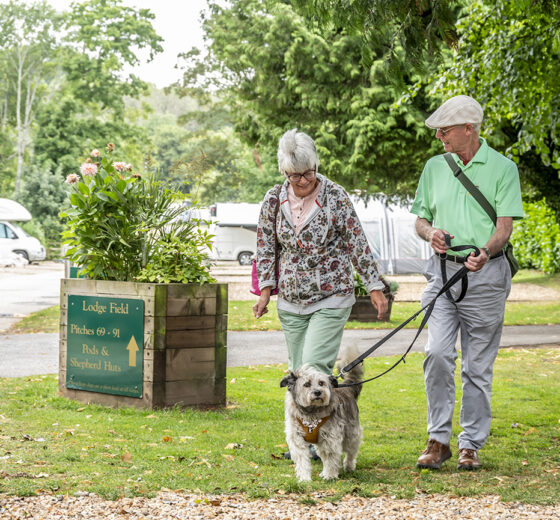 Couple and dog enjoying a stay at South Lytchett Manor